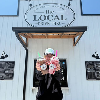 Barista holding cold specialty drinks LOCAL Drive-Thru Highway 100 Centerville TN