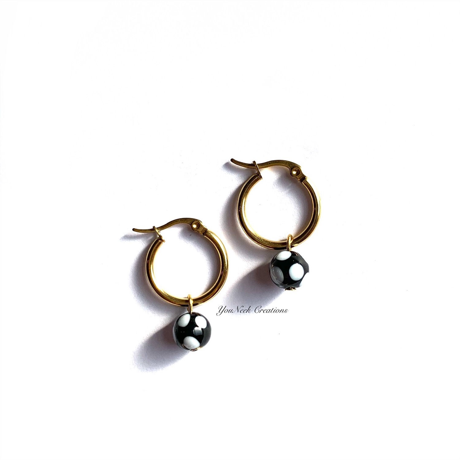 Conta Di Ojo Hoop Earrings