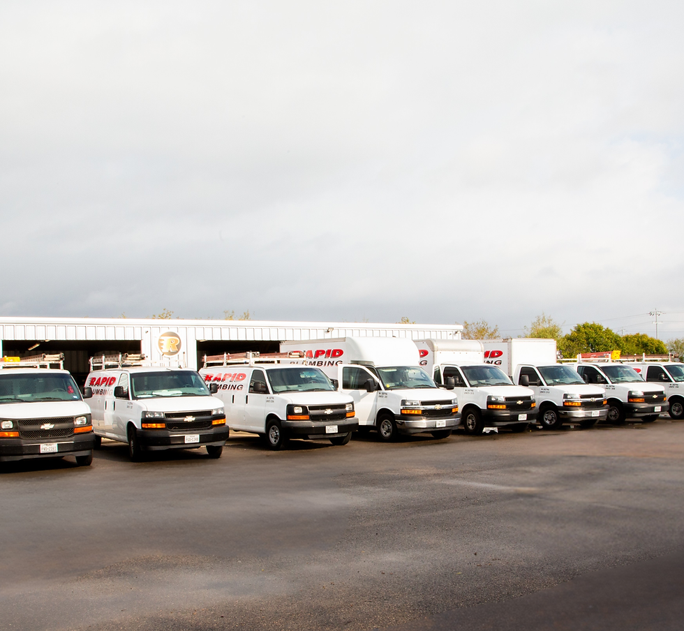 Rapid Plumbing fleet of service trucks ready to respond to gas leak repairs and plumbing service calls in San Antonio TX