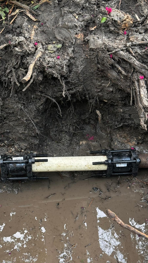 Completed underground water main repair before backfilling in Alamo Heights, Texas.