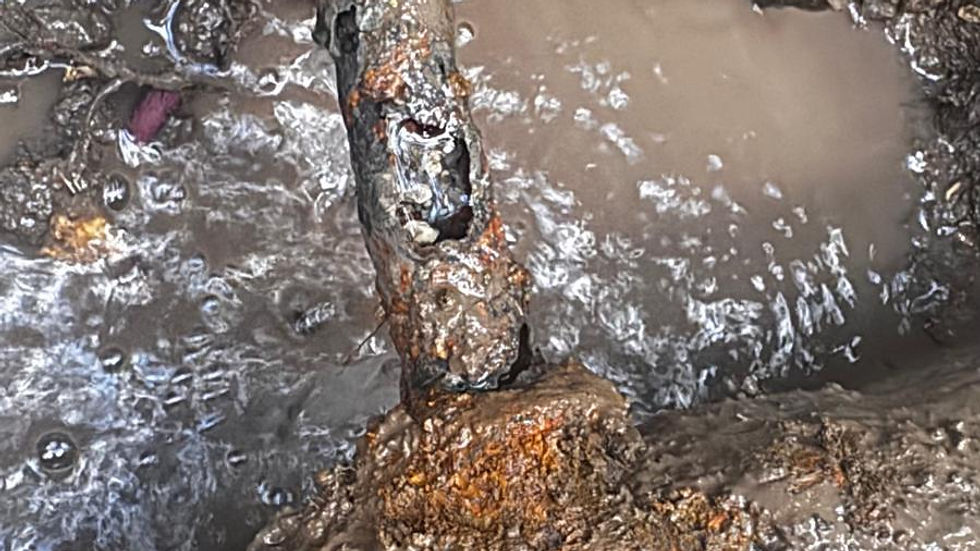 Severely corroded galvanized water line that failed and caused an underground leak