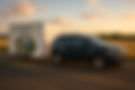 books in trailer with jeep.png