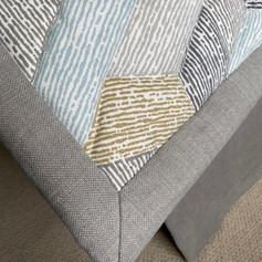 Wadded flat edge with mitred corner