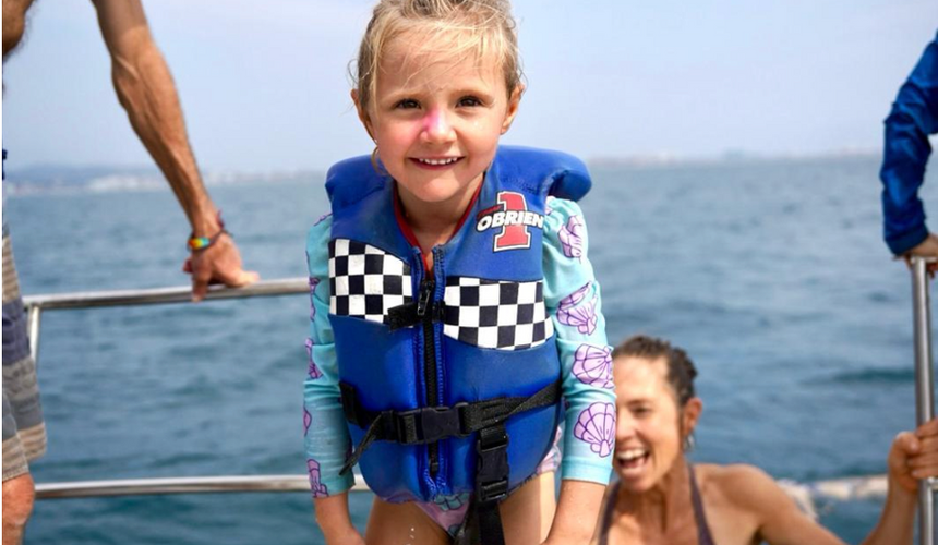 Little girl on a sailboat