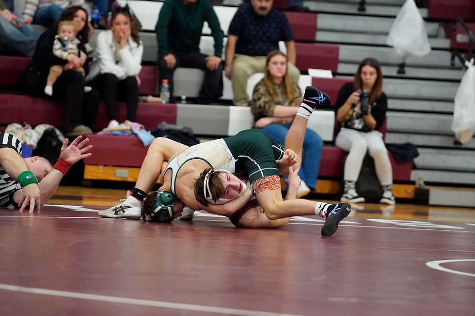 ALL KNOTTED UP… In last week’s rivalry conference wrestling dual between Coloma and Watervliet, Brody Ashley of the Comets puts JT Isbrecht on his back during their 120-pound bout, looking to secure near-fall points in his match and bonus points for his team. Ashley, a defending state placer, would go on to win via technical fall, 18-0, helping Coloma pull off the victory, 59-18. (TCR photo by Jerrod Birmele)