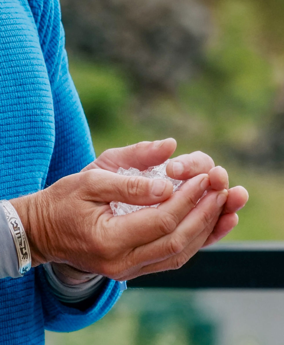 hands holding ice