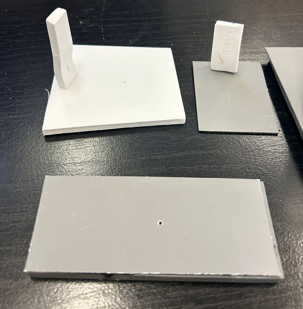 Specimen stages with white and gray backgrounds