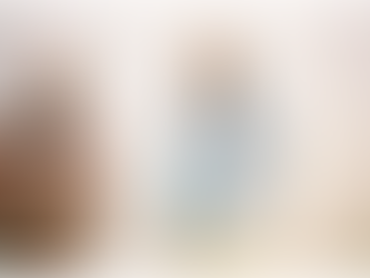 Leon Thomas and Ty Dolla $ign pose together in stylish streetwear—Leon in a camo jacket and matching pants, Ty in a graffiti-style denim jacket and white sunglasses—standing against a plain light backdrop.