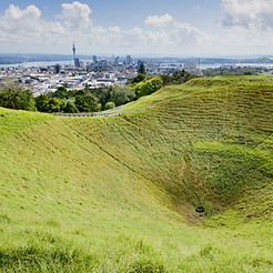 Volcanic crater at the summit of Maungawhau / Mount Eden overlooking Auckland 