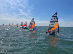 RS Tera Sports and Pros sailing upwind on a sunny day