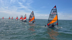 RS Tera Sports and Pros sailing upwind on a sunny day