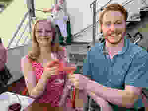 Me and my bother clinking glasses of pink sangria on the rooftop bar at Terrance BA