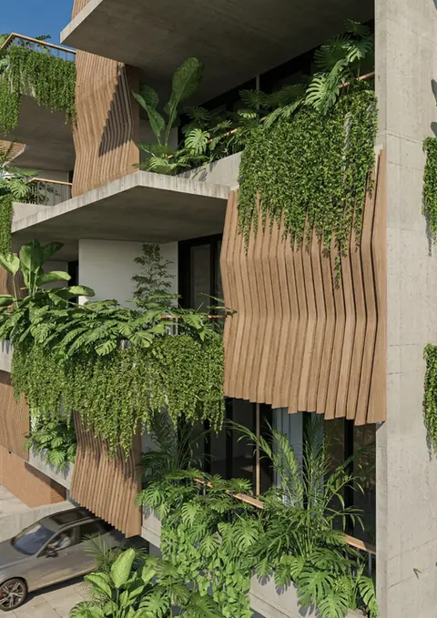 Vista frontal de balcones amplios con jardines y vegetación en arquitectura residencial Cali.