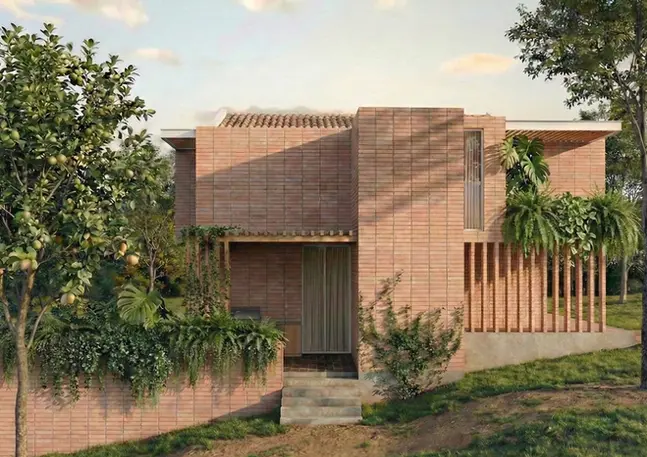 Fachada lateral de diseño arquitectónico en terreno inclinado.