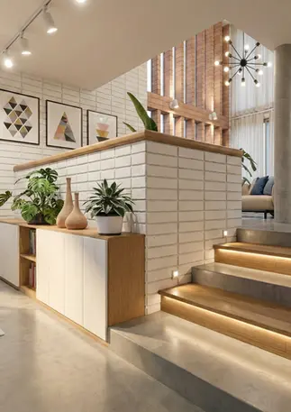 Cambio de nivel entre comedor y sala en diseño interior de casa en ladera.