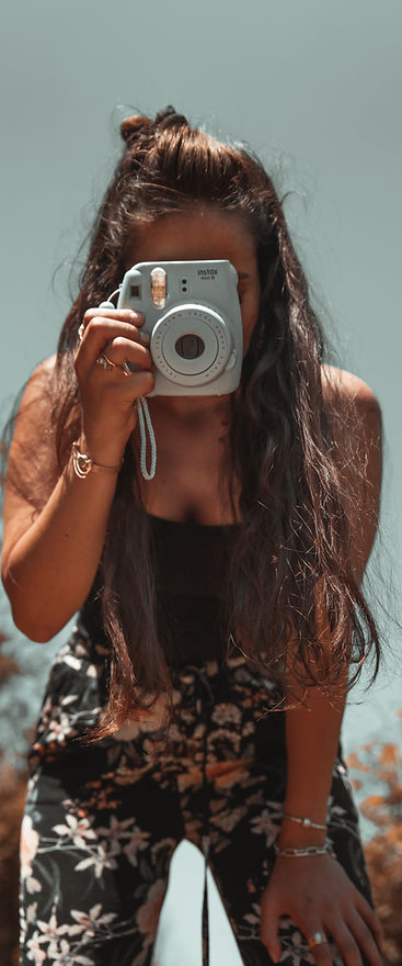 woman in black and white floral tank top