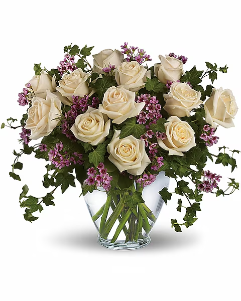 A vibrant bouquet of flowers with mixed blooms, including white roses, lilies, and daisies on a white background