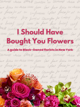 A bed of flowers and roses multi colored with a bright text on a beige background