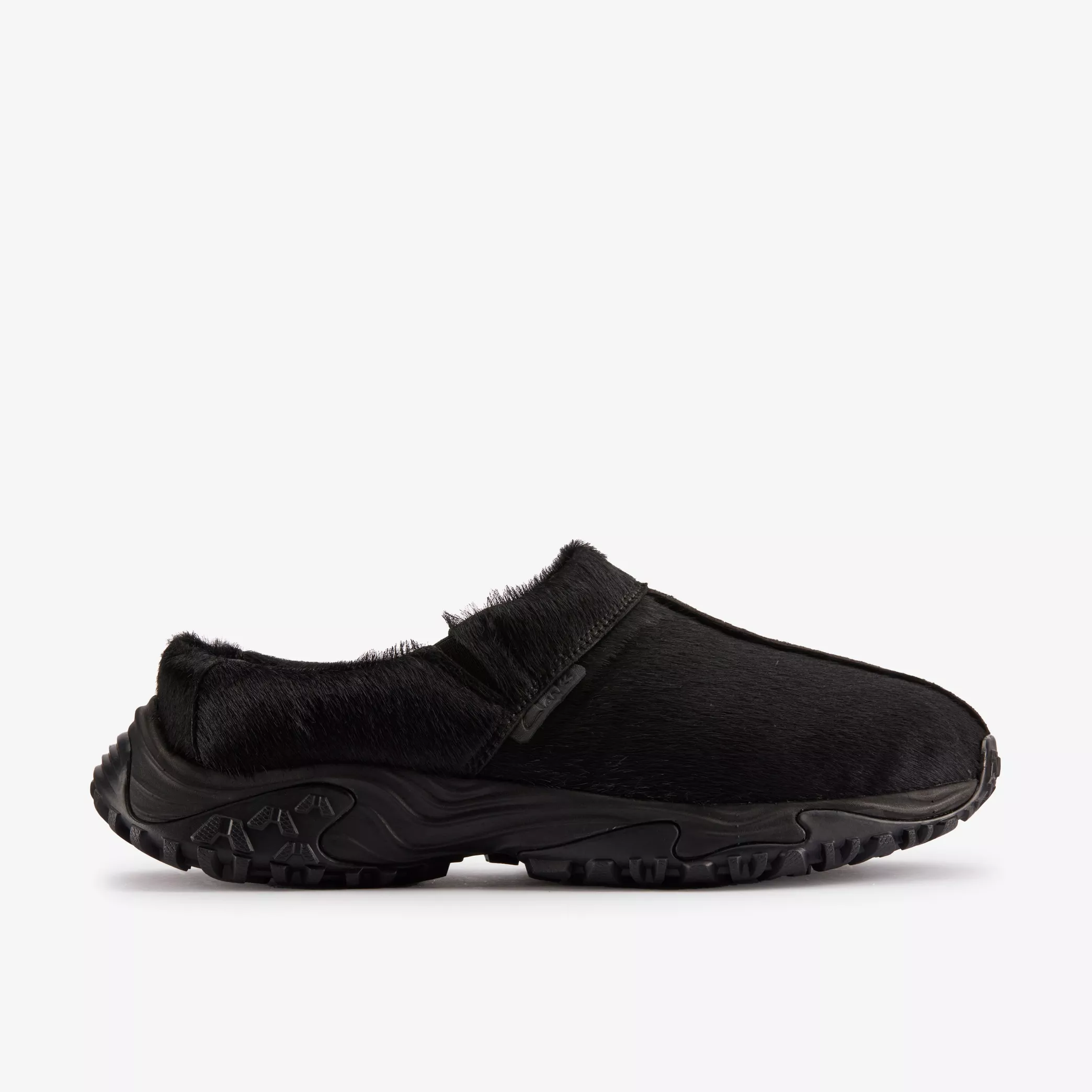 Black pony hair-effect cow leather shoe with puffy duck down filling, cushioned footbed with 'Coming Up Roses' branding, lightweight, and rubber outsole for traction.