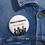 Thumbnail: White round ‘Silence is Compliance – Time to Act Up!’ button pinned to denim jacket, featuring black raised fists against whi
