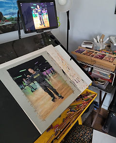 recent commission on art desk 2025.jpg