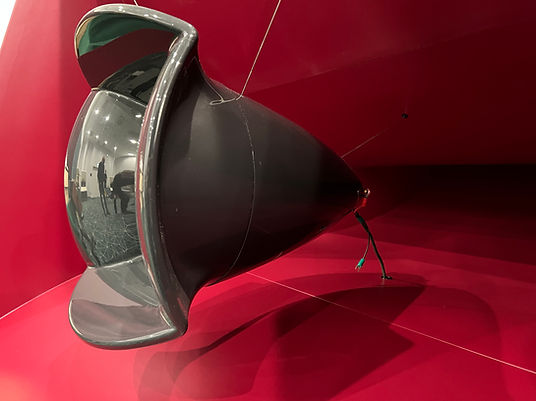 Side angle of Elysio tweeter in gloss black