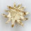 Thumbnail: Yves Saint Laurent zonnebloem broche door Robert Goossens