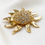 Thumbnail: Yves Saint Laurent zonnebloem broche door Robert Goossens