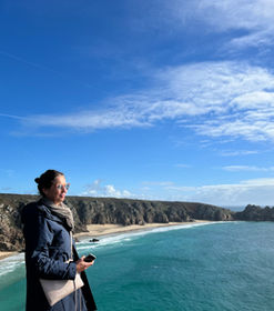 A student, overlooking the ocean.