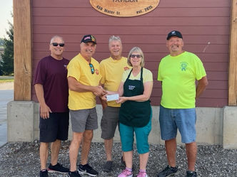Portland Cruisers present donations to Portland Community Fund and Portland Food Bank