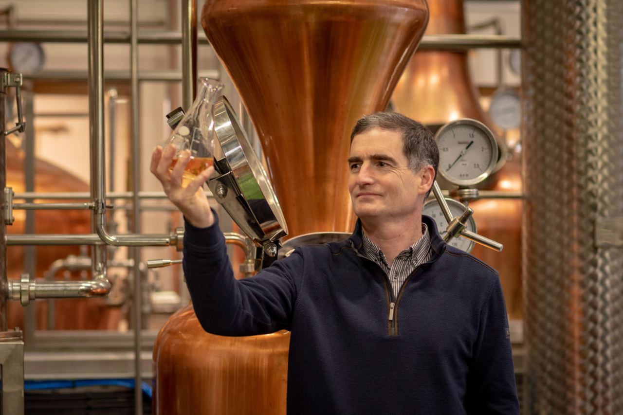 Morgan at still with whisky