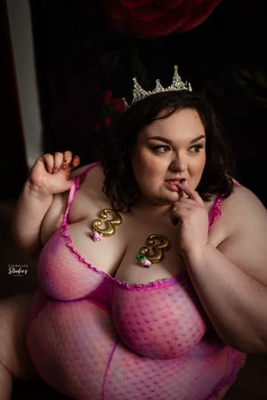 woman in a pink lingerie on her 33rd birthday