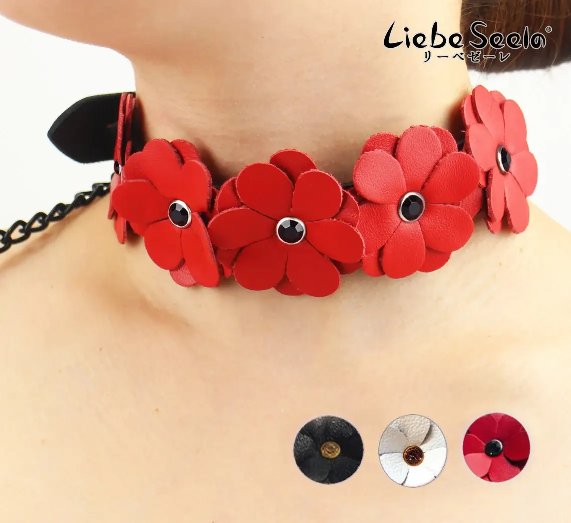 red flower leash and collar on a female neck