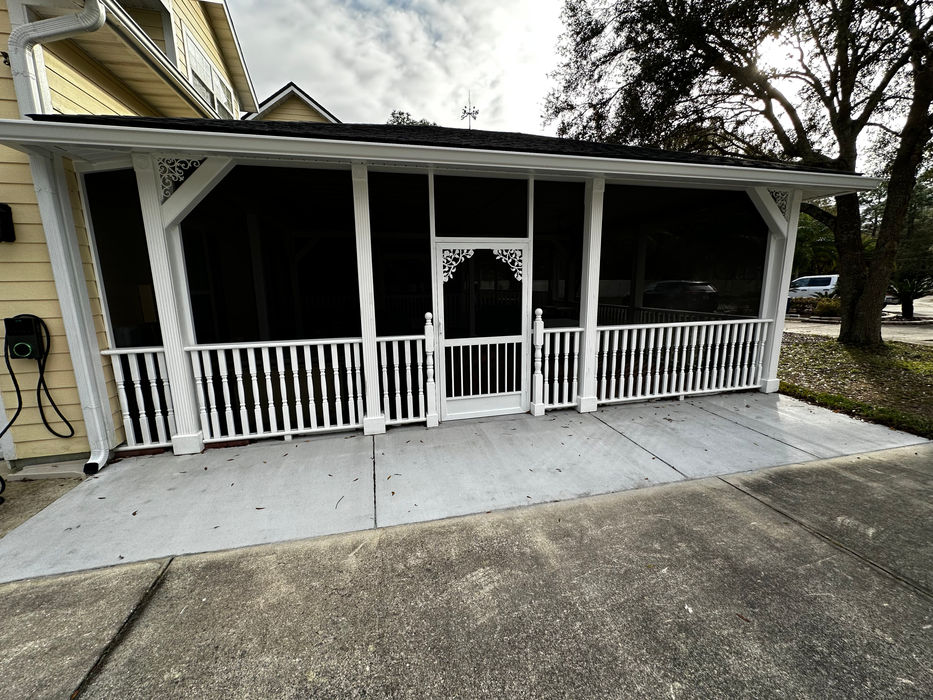 Screen-enclosed front porch as seen from exterior
