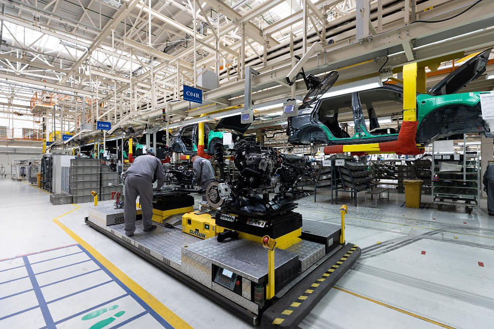 Inside a manufacturing facility making cars