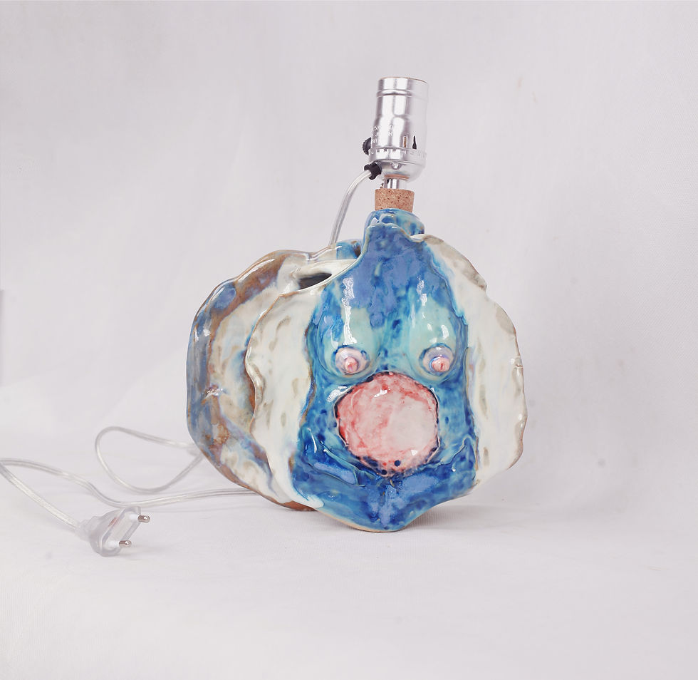 Thumbnail: Sculptural ceramic lamp with woman-like form, handbuilt, glazed and colored stoneware