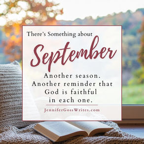 Cozy autumn scene with an open book by a window overlooking fall foliage, featuring the title “There’s Something About September.”