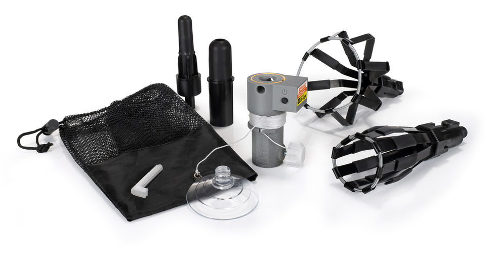 Product photography of a lightbulb changer kit showcasing all included contents, using spot focusing to keep all parts in sharp, clear detail.