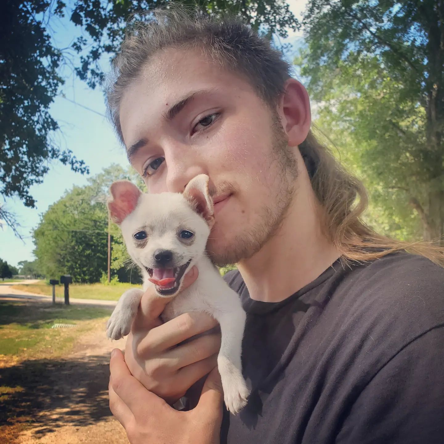 Gabriel Leddy holding Rosco