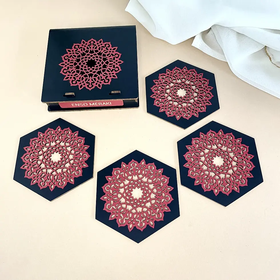 Thumbnail: Aurelia laser cut coaster set with designer box in black and red, angled lifestyle image