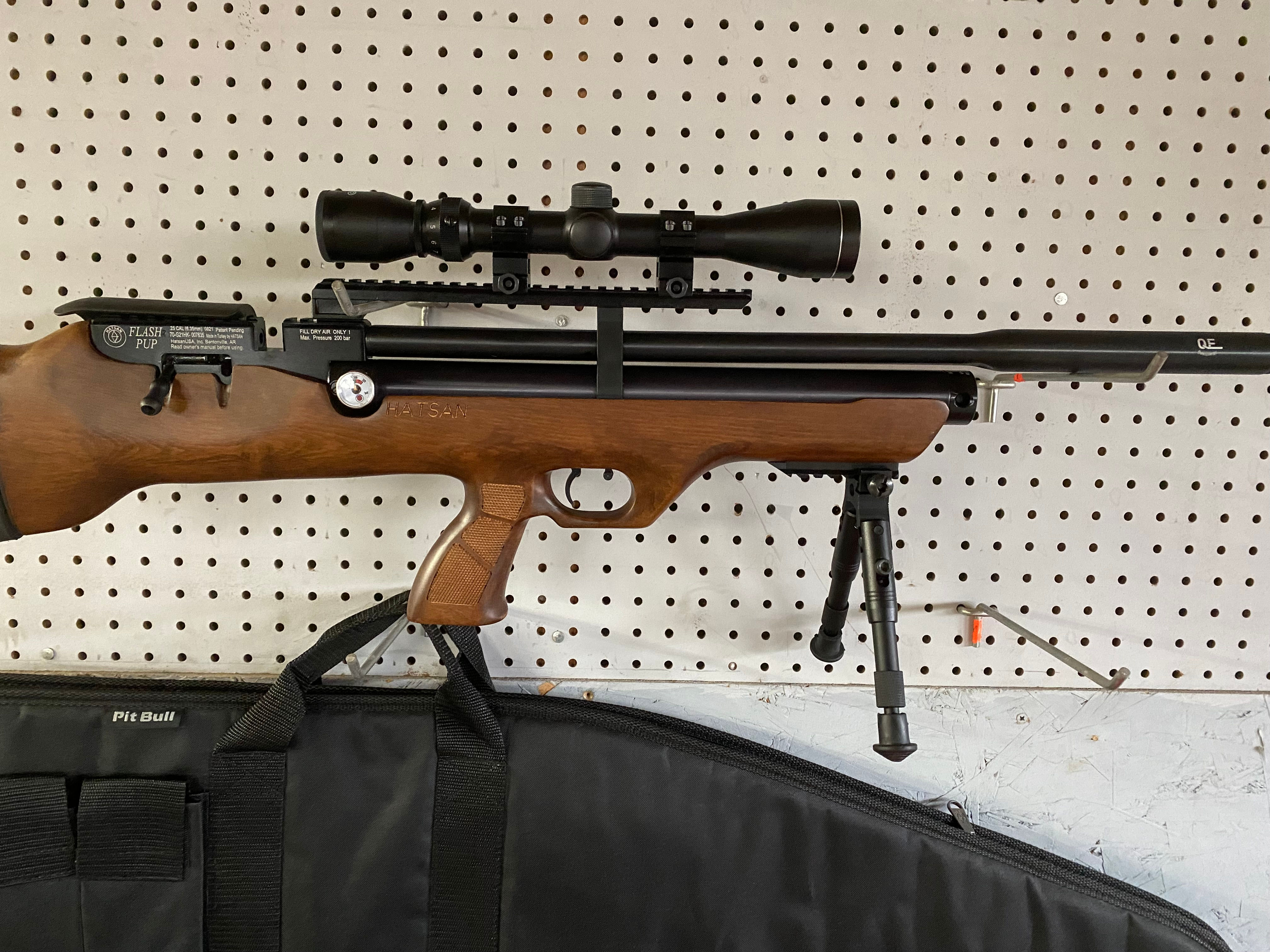 Hatsan .25 bullpup PCP rifle  with bulldog case