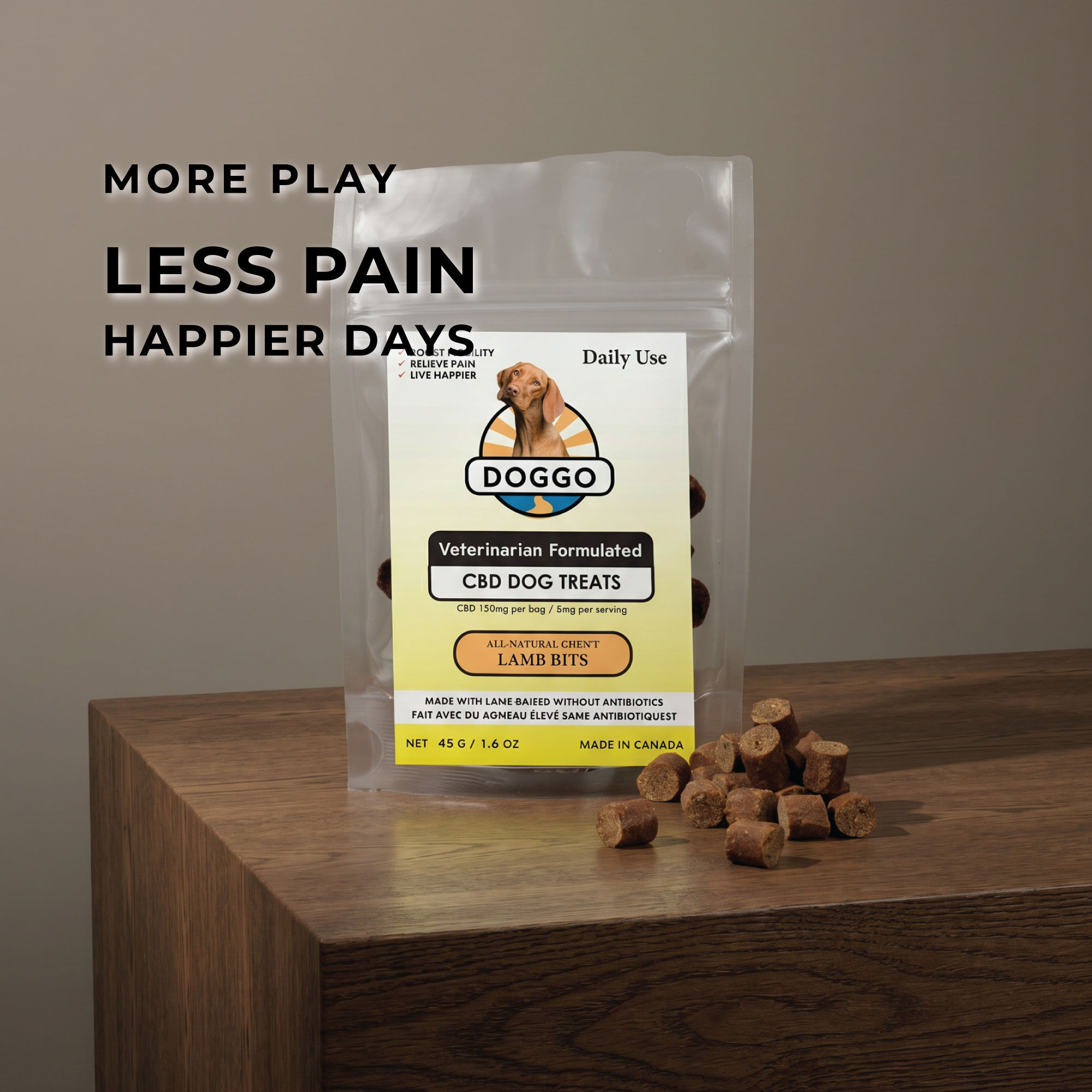 DOGGO veterinarian-formulated CBD dog treats displayed on a wooden table with overlay text reading “More Play,” “Less Pain,”