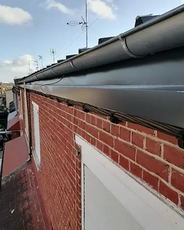 gouttiere-zinc-renovation-facade-dubois-couverture.webp