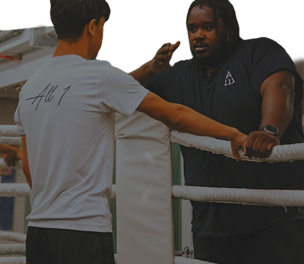 Boxer talking to coach