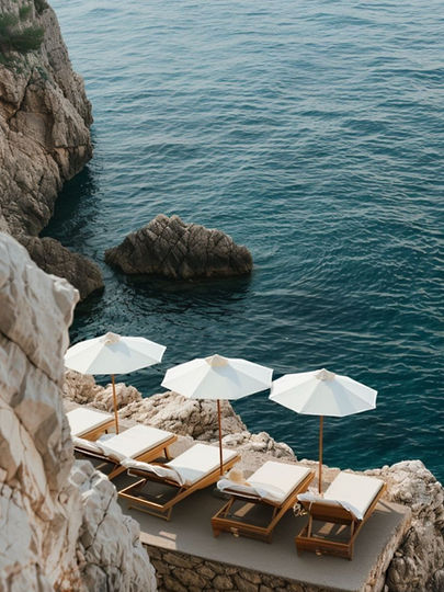 Seafront terrace and sun loungers at a Riviera hotel