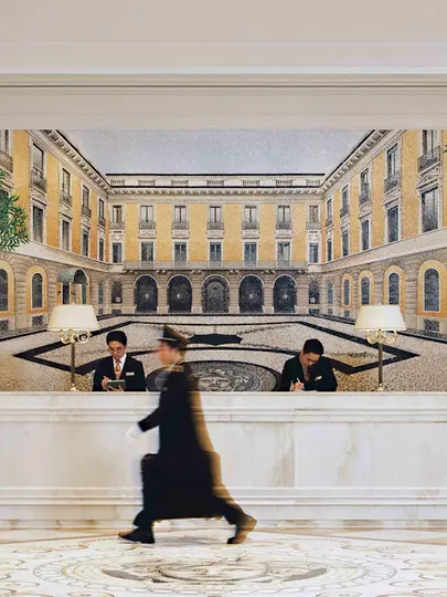 Classical hotel facade and formal garden on the French Riviera