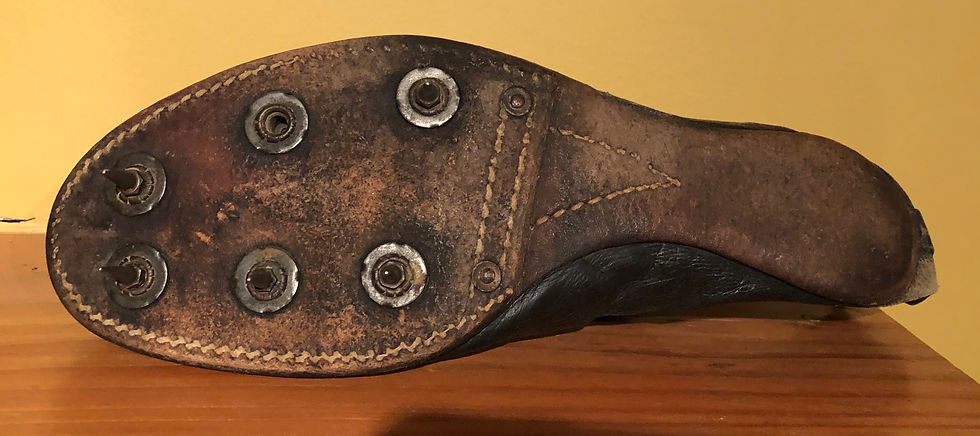 Leather outsole was sleeker and spikes were removable and replaceable