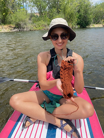 A Sunday Float on the Boise River, featuring a cabled sweater sleeve.
