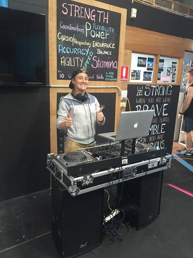 Melbourne DJ behind the decks at a gym