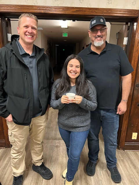 From left: Greeters Dan Galler and his friends